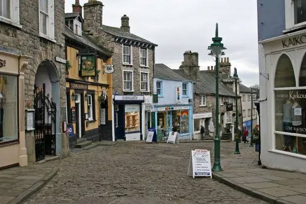 Charming streets of Kendal, showcasing its vibrant markets and cozy cafes.